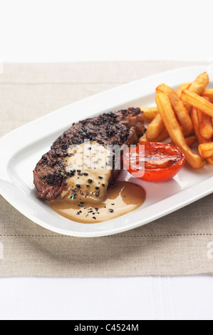 Steak au poivre on tray, close-up Stock Photo