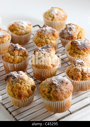 Lemon poppy muffins on cooling rack, close-up Stock Photo