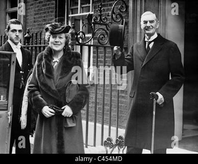 Chamberlain and his wife in front of Downing Street, 1939 Stock Photo