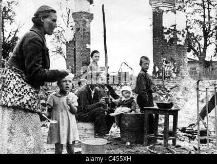 Soviet Russian family in the front line zone watches battle coming ...