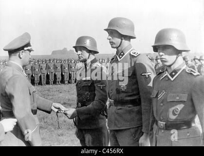 Artur Axmann gives 'armbands' to an SS Panzer Division 'Hitler Youth' Stock Photo