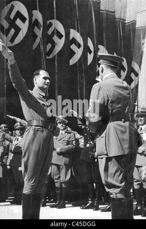 Rudolf Hess salutes Adolf Hitler on the Nuremberg Rally in 1938 Stock Photo