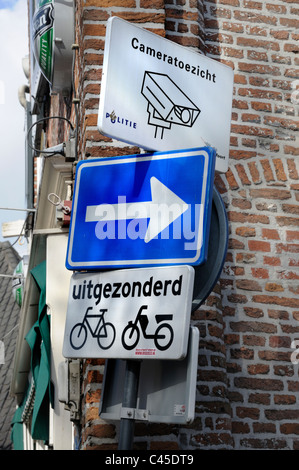 Amersfoort, Netherlands. Signs. CCTV surveillance; cycling zone; one way Stock Photo
