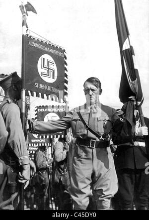 Adolf Hitler in 'blood flag consecration' on the Nuremberg Rally, 1936 Stock Photo