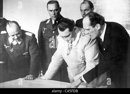 Karl Bodenschatz (on the left) and Hermann Goering (in the middle ...