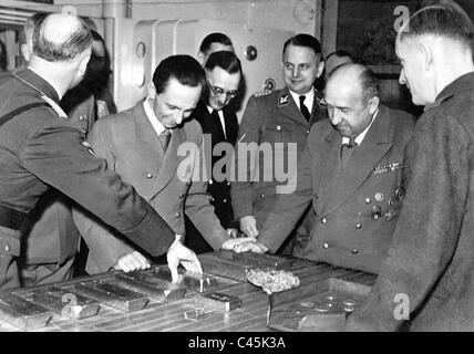 Joseph Goebbels, Funk and Ohlendorf with gold bars made from the gold of murdered Jews, 1944 Stock Photo