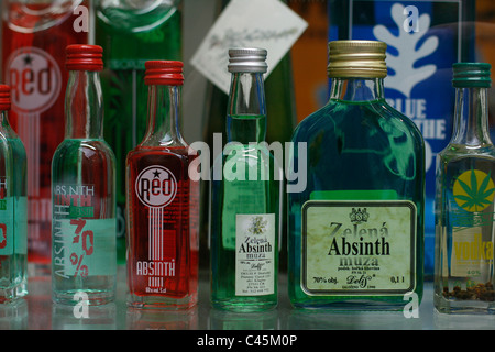 Different bottles of absinthe displayed in a shop window in Prague, Czech Republic, Europe. Stock Photo