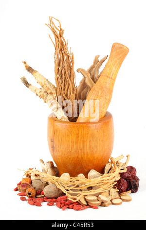 Chinese traditional herbs or medicine isolated on white background. Stock Photo