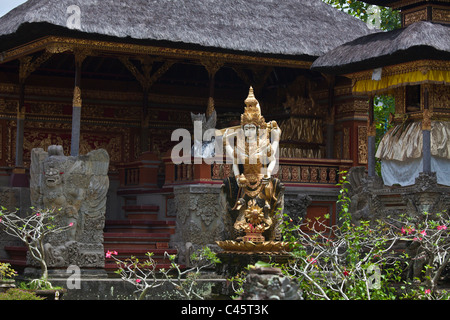 Sculpture of Hindu deity at PURA TAMAN SARASWATI - UBUD, BALI, INDONESIA Stock Photo