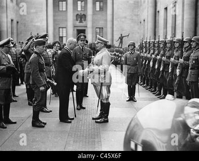 Robert Ley, Hermann Goering, Albert Speer with a munitions worker, 1942 Stock Photo