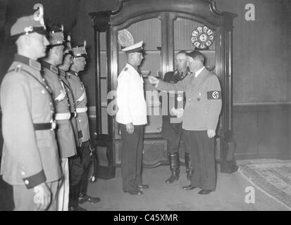 Heinrich Himmler and Adolf Hitler view new police uniforms, 1936 Stock Photo