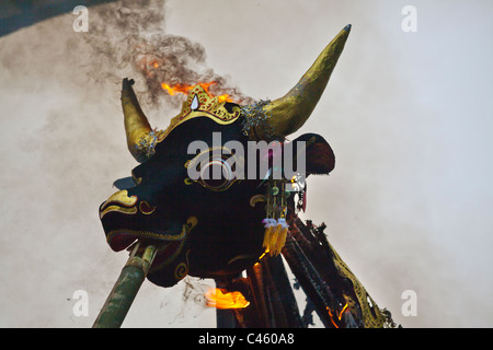 A Hindu style CREMATION where the dead body is burned inside a wooden bull - UBUD, BALI, INDONESIA Stock Photo