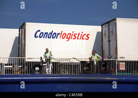 Condorlogistics trucks on ferry arriving at St Peters Port, Guernsey in April Stock Photo