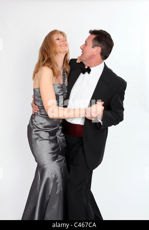 Couple dancing, wearing smart evening clothes Stock Photo