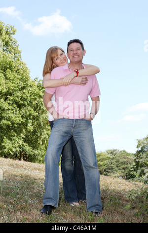Couple hugging and smiling in the countryside. Stock Photo