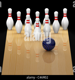 Ten pin bowling lane with blue ball in action about to strike on black background Stock Photo