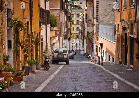 View of a sloping street in a residential district of Rome, Italy Stock Photo