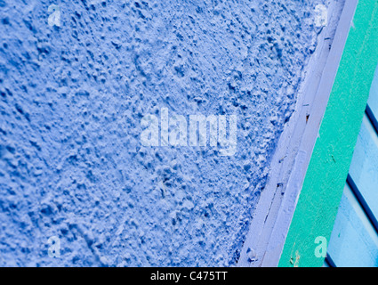 Detail of the exterior of a building coated with different colors of paint Stock Photo
