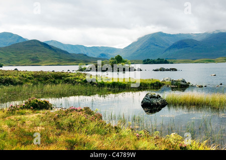 West over Lochan na h-Achlaise in Black Mount area of the south end of Rannoch Moor southeast of Glencoe. Highlands, Scotland Stock Photo