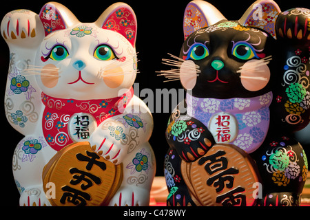 Hand-painted ceramic maneki-neko cats made by local artisan at Hida-no-Sato Folk Village, Takayama, Gifu, Japan, Asia. Stock Photo
