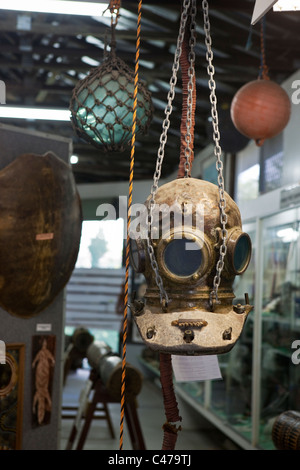 Pearl diving helmut and exhibit at the Torres Strait Heritage Museum. Horn Island, Torres Strait Islands, Queensland, Australia Stock Photo