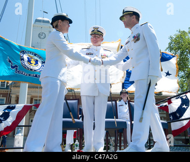 First female commander of a US Service Academy Rear Adm. Sandra Stosz (L) takes command of the US Coast Guard Academy. Stock Photo