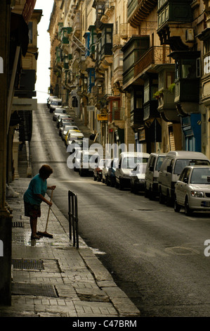 Typical narrow street ( St Paul's ) in Valletta the capital city of Malta island Stock Photo