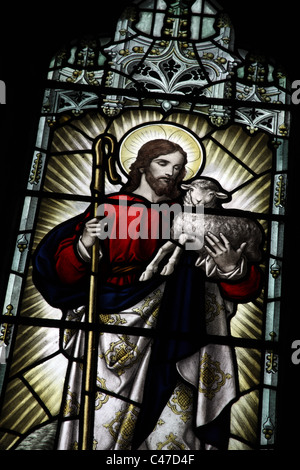 A stained glass window depicting Jesus the Good Shepherd, St Mary the Virgin Church, Souldern, Oxfordshire Stock Photo