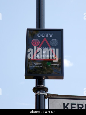 Police CCTV recording warning sign in residential street in Ealing, West London Stock Photo