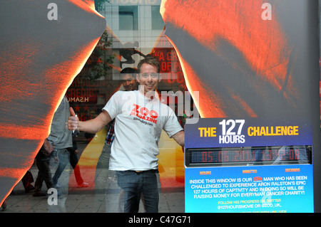 127 hours challenge Zoo magazine HMV store window Oxford Street London Stock Photo