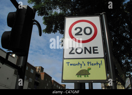 20 is plenty speed limit road signs 30 mph english village England UK ...