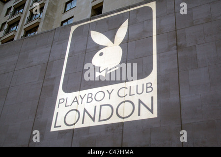 The Playboy Corporate Logo projected onto a wall during the reopening of the Playboy Club London Stock Photo