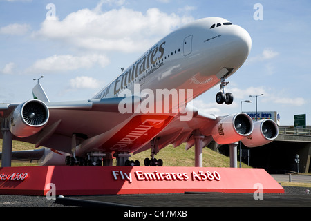 Big scale model of an Emirates Airbus A380-861 A6-EDH plane at the gateway to London Heathrow airport near the A4 road. UK Stock Photo