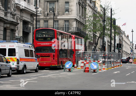 Traffic waiting at traffic lights in roadworks in london Stock Photo
