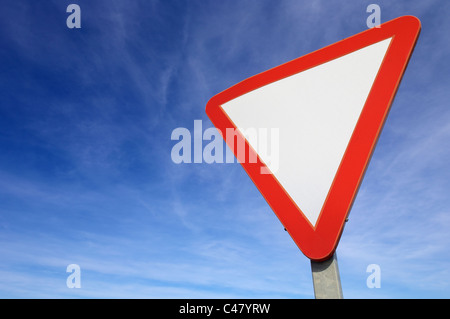 European signal give way to blue sky Stock Photo
