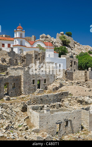 Ruins around abandoned hill town of Mikro Chorio on Tilos Island, Greece Stock Photo