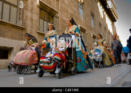 Women take part during one of the parades at the Fallas in Valencia. Pic Brian Hickey Stock Photo
