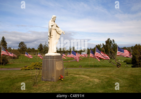 American flags fly over a cemetery on Memorial Day Stock Photo