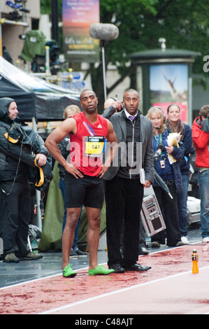 Tyson Gay preparing for an interview with the BBC at the Great City Games in Manchester on 15th May 2011. Stock Photo