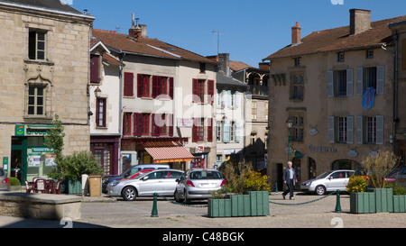 Traditional building and shop fronts in town square, Bourganeuf, Creuse, France Stock Photo