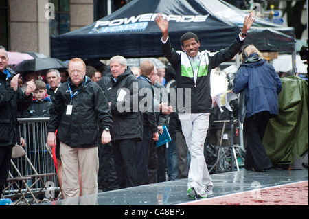 Haile Gebreselassie waves to the crowd at the Great City Games in Manchester on 15th May 2011. Stock Photo