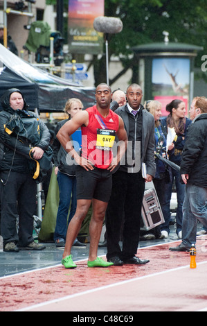 Tyson Gay preparing for an interview with the BBC at the Great City Games in Manchester on 15th May 2011. Stock Photo