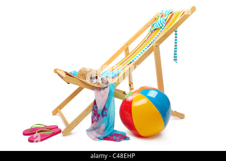 Beach chair and accessories isolated on white background. Stock Photo