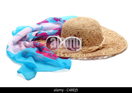 Straw beach hat, sun glasses and shawl isolated on white. Stock Photo