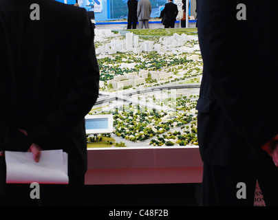 FRANCE CANNES. 10th March 2009. MIPIM the world's biggest property fair. Investors look at model of Krasnoder region Russia Stock Photo