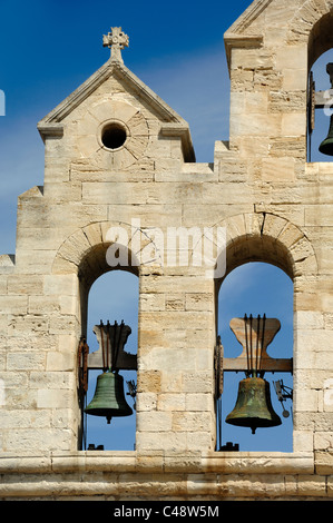 Two Bells in the Belfry or Bell Tower of the c12th Fortified Church of Notre-Dame-de-la-Mer Les Saintes-Maries-de-la-Mer Camargue Provence France Stock Photo