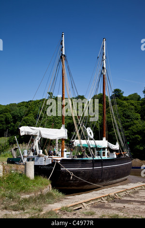 Sailing boat at Cotehele Quay (taken from the public highway) on the banks of the River Tamar, Cornwall Stock Photo