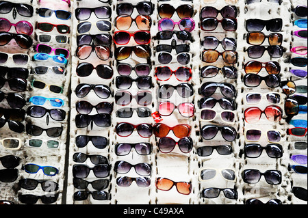 Detail of a street stall in Cartagena, Colombia selling various sunglasses Stock Photo