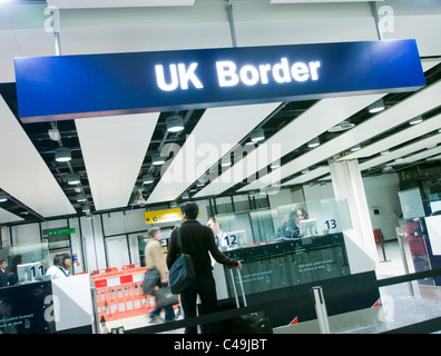 Immigration at UK Border control at an airport in Britain Stock Photo
