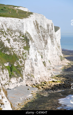 White chalk cliffs of Dover & English Channel at low tide Kent England UK